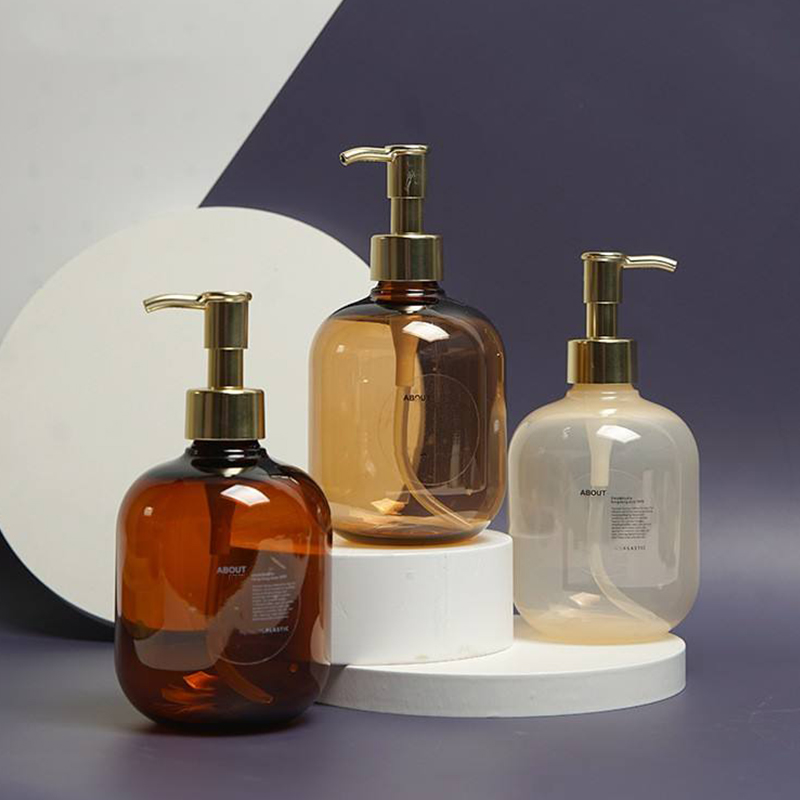 300Ml 500Ml Nhựa PET Màu Hổ Phách Tròn Trống Dầu Xả Body Lotion Chai Gold PET Lotion Pump Chai Dầu Gội