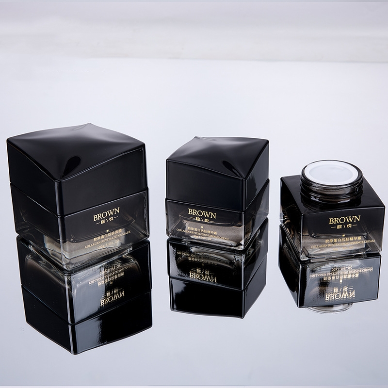 Hũ kem thủy tinh hình vuông độc đáo với thiết kế nắp nâng cho bao bì mỹ phẩm Hũ kem thủy tinh hình vuông độc đáo với thiết kế nắp nâng cho bao bì mỹ phẩm